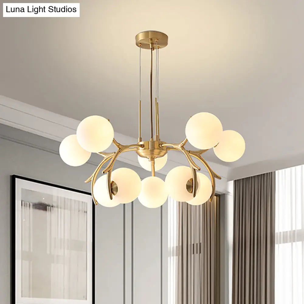 Sleek Modern Brass Pendant Chandelier With 10 White Glass Bulbs For Bedroom Ceiling - Antler Arm