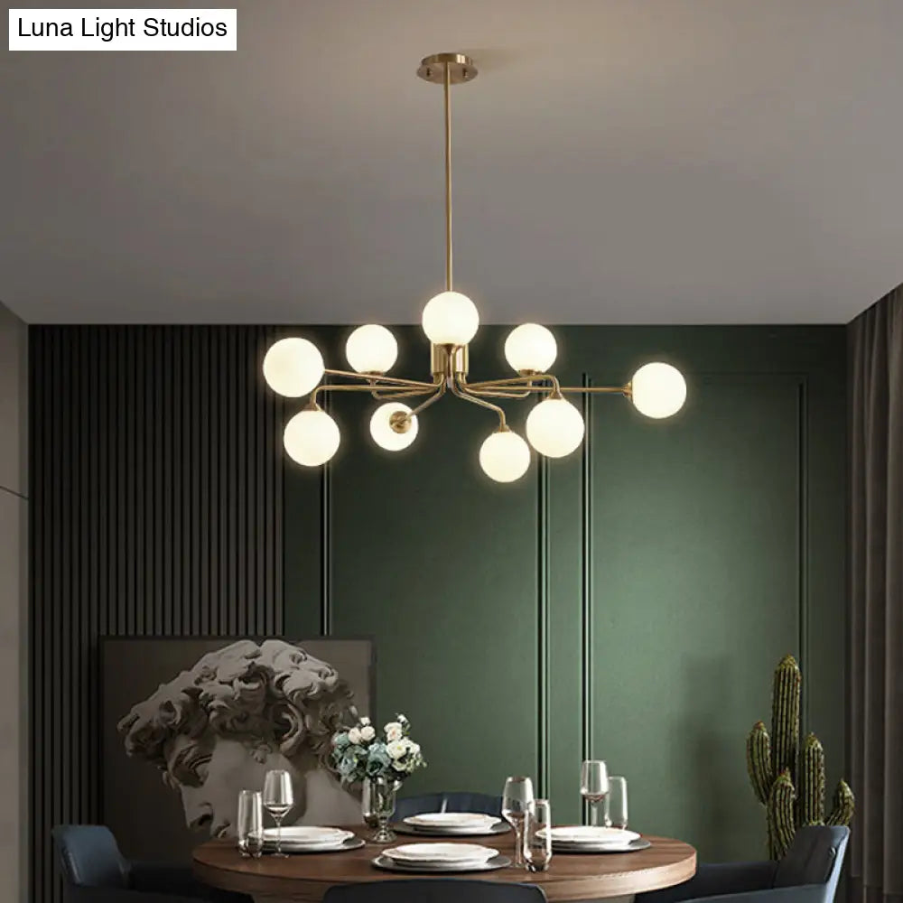 Sleek Modos Chandelier: Simplicity White Glass Ceiling Light With Brass Finish For Living Room