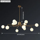 Sleek Modos Chandelier: Simplicity White Glass Ceiling Light With Brass Finish For Living Room