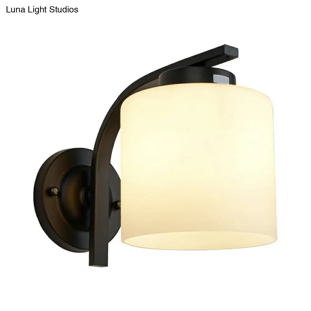 Sleek White Glass Wall Sconce With Black Accents For Living Room