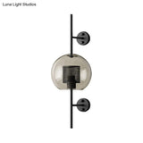 Smoke Gray Glass Colonial Sphere Wall Sconce - Black Finish Cylinder Wire Mesh Inside 8/10 Wide