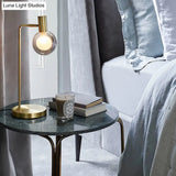 Stunning Gold Spherical Table Lamp With Smoke Gray/Clear Glass Shade - Perfect For Bedroom