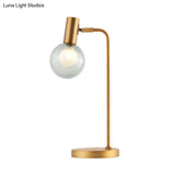 Stunning Gold Spherical Table Lamp With Smoke Gray/Clear Glass Shade - Perfect For Bedroom