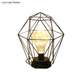 Stylish Black Metal Table Lamp With Cage Shade - Ideal For Bedside Or Loft Decor