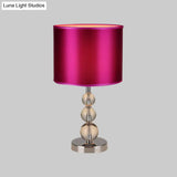 Syrma - Purple Cylinder Shaded Table Light: Elegant Nightstand Lamp