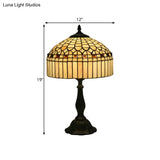 Tiffany Style Beige Glass Nightstand Light

Note: It Is Important To Keep The Keywords Style And