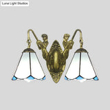 Tiffany Style Wall Sconce With Flared White/Beige Glass And Mermaid Backplate - 2 Light
