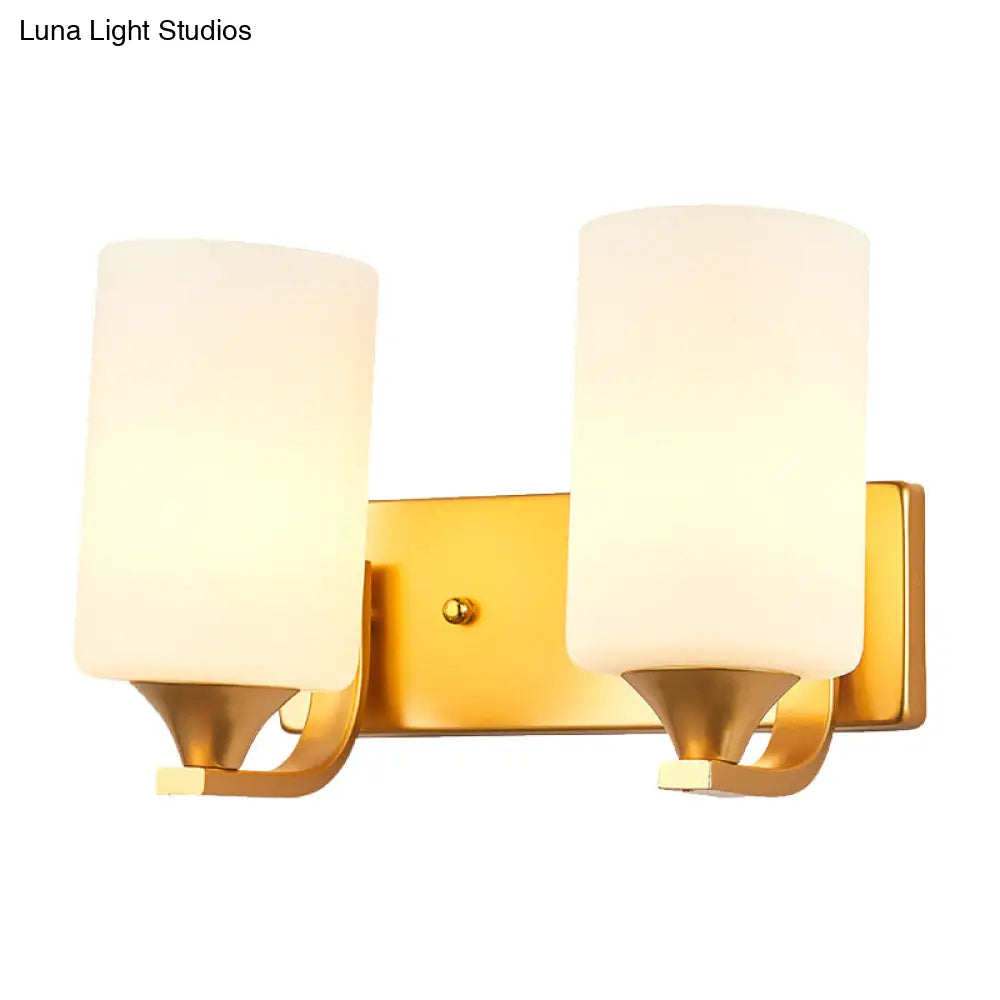 Traditional 2-Bulb Gold Wall Lamp With Milky Glass Cylindrical Fixture