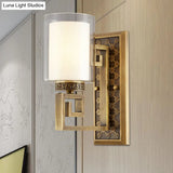 Traditional Antiqued Gold/Black Sconce With Dual Shade Pillar - Wall Mounted Light