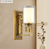 Traditional Antiqued Gold/Black Sconce With Dual Shade Pillar - Wall Mounted Light