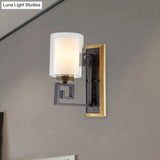 Traditional Antiqued Gold/Black Sconce With Dual Shade Pillar - Wall Mounted Light