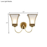 Traditional Bell Metal Wall Sconce With Brass Finish - Elegant Living Room Lighting Fixture