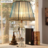 Traditional Blue Fabric Nightstand Lamp With Crystal Base - 1 Light Barrel Design