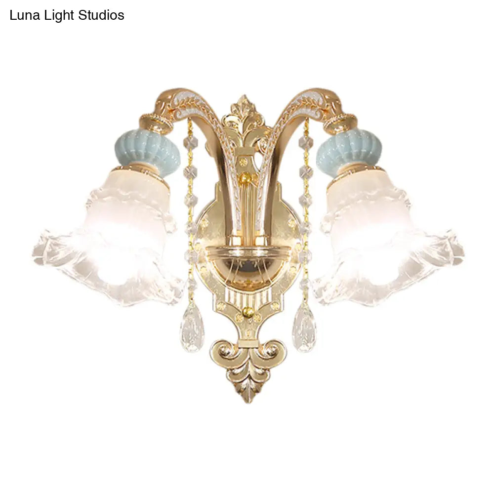 Traditional Blue Frosted Glass Wall Sconce With Ceramic Accent And Ruffle Trim