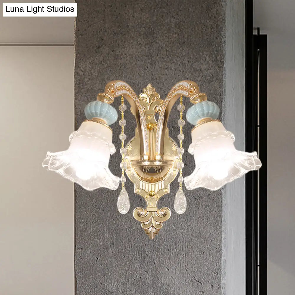 Traditional Blue Frosted Glass Wall Sconce With Ceramic Accent And Ruffle Trim