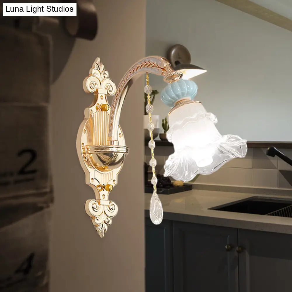 Traditional Blue Frosted Glass Wall Sconce With Ceramic Accent And Ruffle Trim