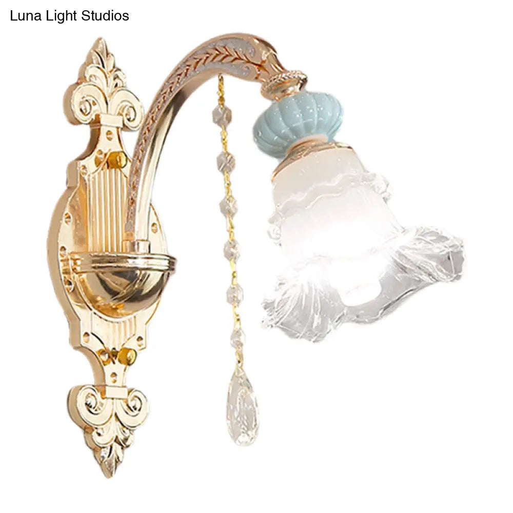 Traditional Blue Frosted Glass Wall Sconce With Ceramic Accent And Ruffle Trim