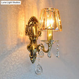 Traditional Brass 1-Light Candle Wall Sconce With Clear Crystal Shade