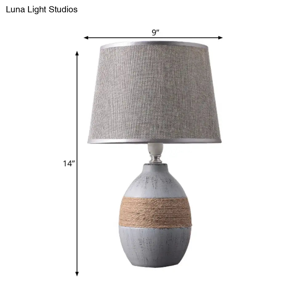 Traditional Flaxen/Grey Nightstand Lamp With Ceramic Base - 1-Light Fabric Drum Desk Light