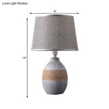 Traditional Flaxen/Grey Nightstand Lamp With Ceramic Base - 1-Light Fabric Drum Desk Light