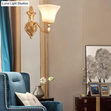 Traditional Half-Bulb Brass Wall Sconce With Bell Shade & Frosted Glass