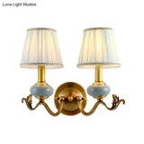 Traditional Style Brass Wall Sconce With Curved Arm Fabric Shade