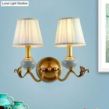 Traditional Style Brass Wall Sconce With Curved Arm Fabric Shade