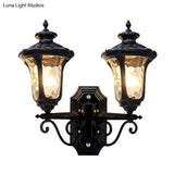 Traditional Urn-Shade Clear Dimple Glass Sconce Lamp - 2 Bulbs Wall Mount Light In Black