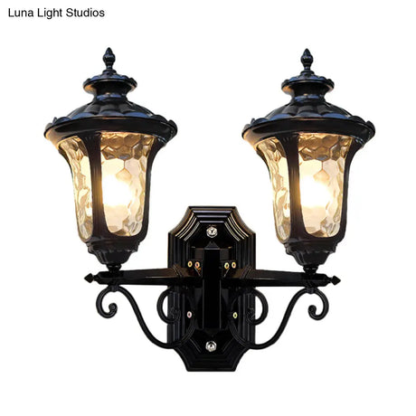 Traditional Urn-Shade Clear Dimple Glass Sconce Lamp - 2 Bulbs Wall Mount Light In Black