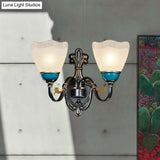 Traditional Wall Mount Sconce Lamp With Ribbed Glass And Curvy Arm Design