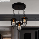 Vintage Black Caged Glass Multi Pendant 3-Light Fixture For Living Room - Round Canopy Hangs With