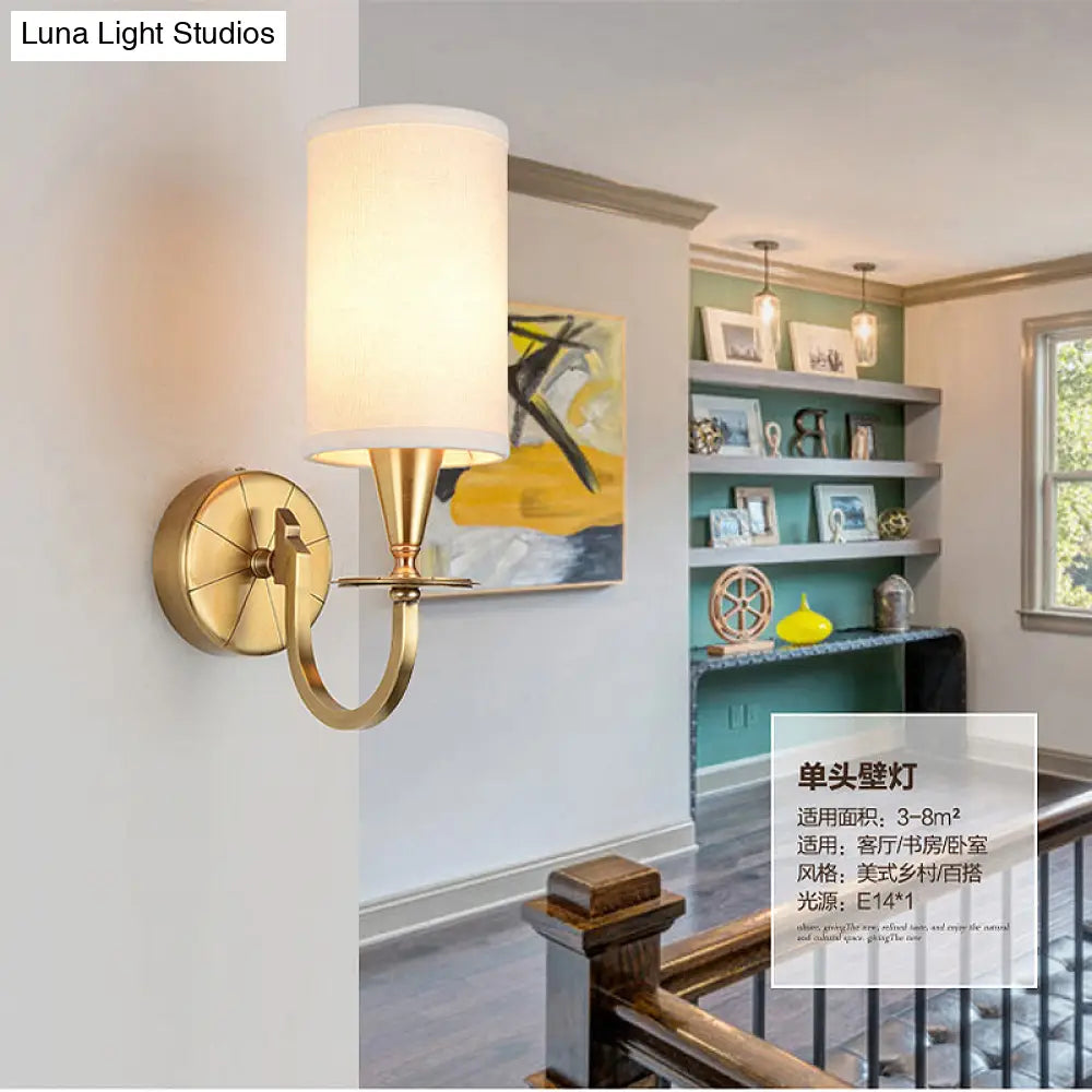 Vintage Brass Cylinder Wall Sconce With Fabric Shade And Arched Metal Arm - Ideal For Bedroom