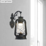 Vintage Clear Glass Lantern Wall Sconce For Outdoor Lighting With Single Bulb In Black/Bronze/Copper