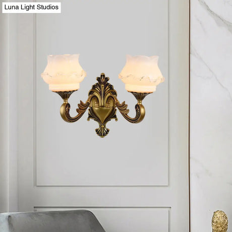 Vintage Curved Arm Brass Wall Lamp With Flower Milk Glass Shade