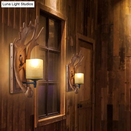 Vintage Deer Horn Wall Lamp With Cylinder Beige Glass Shade For Restaurants