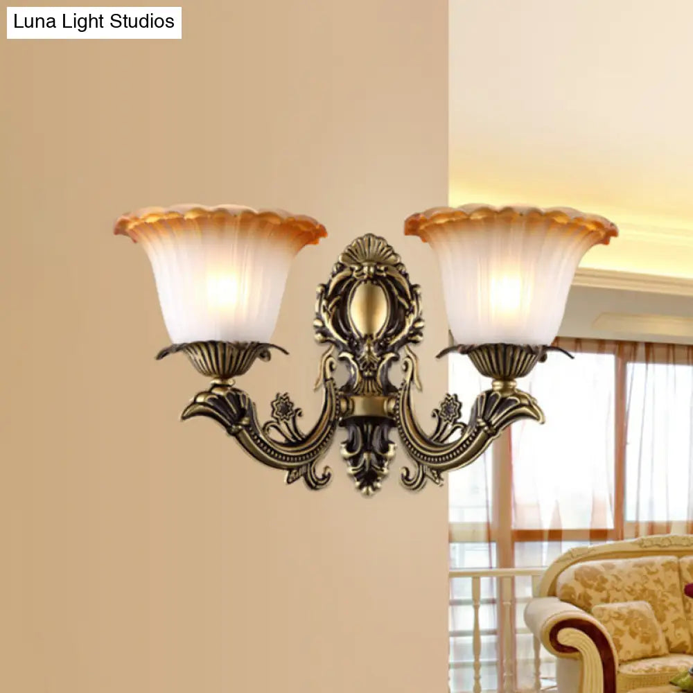 Vintage Floral Wall Sconce With Frosted Glass And Carved Brass Arm