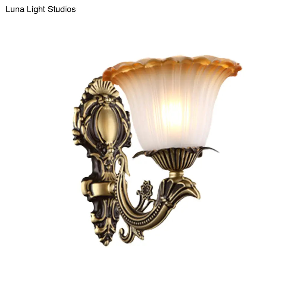 Vintage Floral Wall Sconce With Frosted Glass And Carved Brass Arm