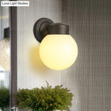 Vintage Globe Wall Sconce With White/Clear Glass Shade - Ideal For Bathrooms
