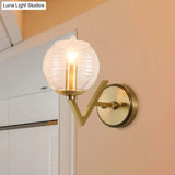 Vintage Gold Colonial Glass Sconce With Ribbed Texture And V-Shaped Metal Arm