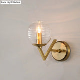 Vintage Gold Colonial Glass Sconce With Ribbed Texture And V-Shaped Metal Arm