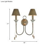 Vintage Iron Swooping Arm Sconce Light - Gold Wall Mount Lamp With Tapered Shade And Carved Spike