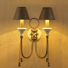 Vintage Iron Swooping Arm Sconce Light - Gold Wall Mount Lamp With Tapered Shade And Carved Spike
