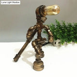 Vintage Metallic Brass Robot Design Table Lamp - Unique Coffee Shop Light With Plumbing Pipe Accent