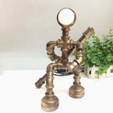 Vintage Metallic Brass Robot Design Table Lamp - Unique Coffee Shop Light With Plumbing Pipe Accent