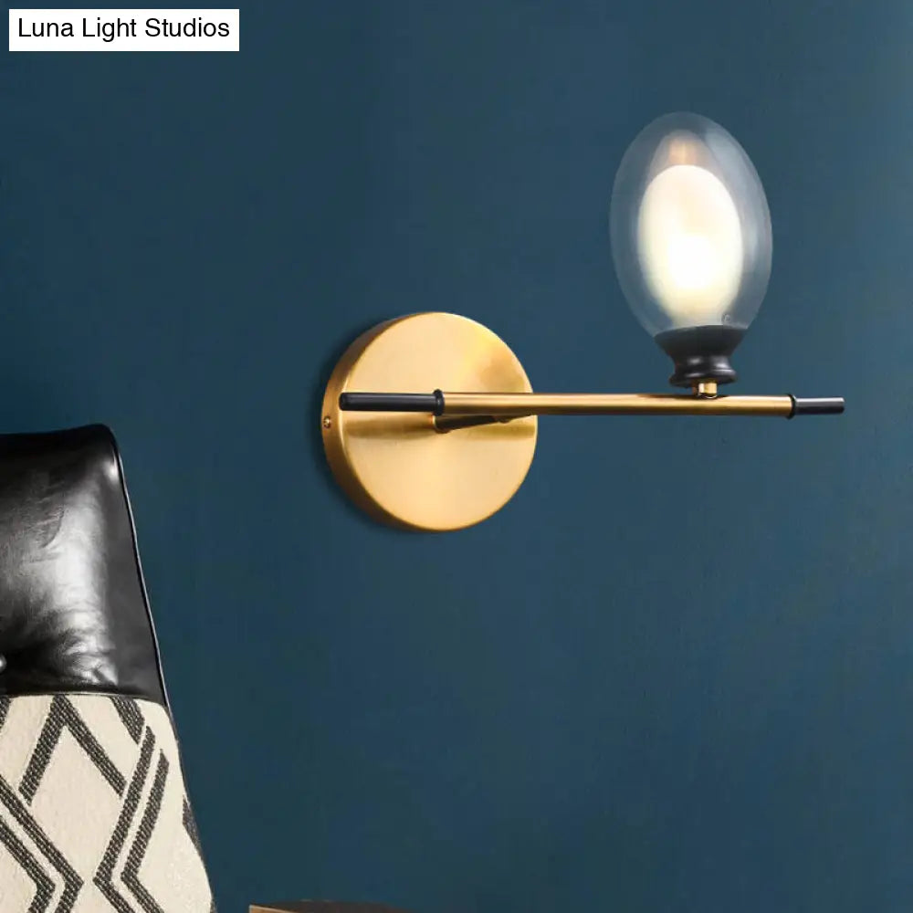 Vintage Oval Wall Sconce With 1 Clear Glass Light - Bedroom Mounted Lamp Featuring Brass Bar