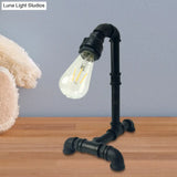 Vintage Rust/Black Metal Arm Night Table Plug-In Lamp With Exposed Bulb