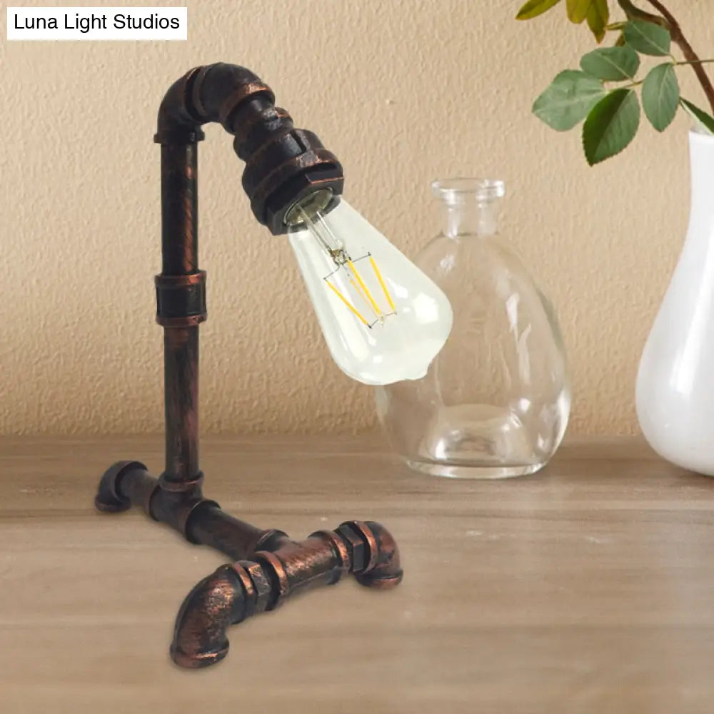 Vintage Rust/Black Metal Arm Night Table Plug-In Lamp With Exposed Bulb
