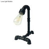 Vintage Rust/Black Metal Arm Night Table Plug-In Lamp With Exposed Bulb