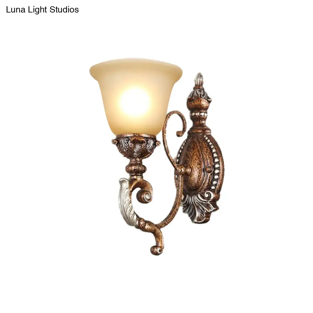 Vintage Sconce Light Fixture: 1-Light Frosted Glass Wall Mount With Carved Metal Arm In Rust