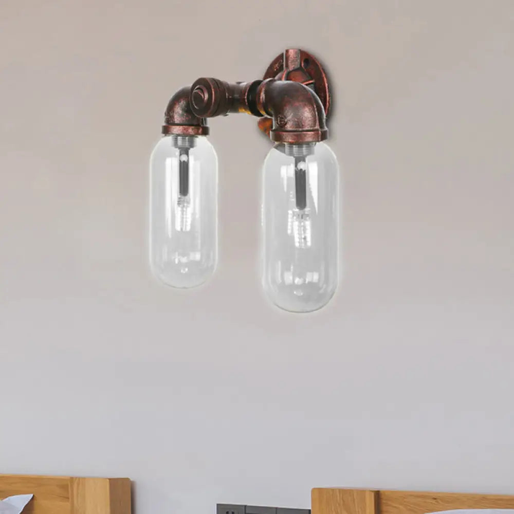 Weathered Copper 2-Light Industrial Sconce With Clear Glass Oval Shade - Wall Lighting Fixture / A